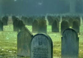 gray tombstones during daytime
